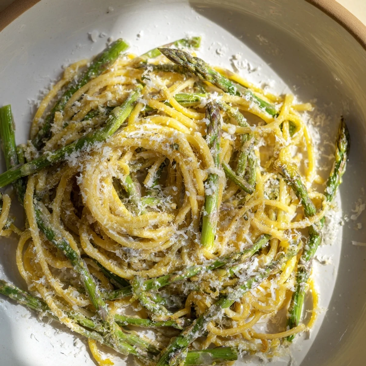 Golden, flaky star-shaped asparagus bundle wraps fresh from the oven, perfect for brunch.