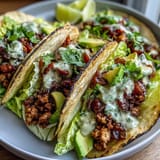 Healthy Easy 15-Minute Turkey Taco Lettuce Wraps with seasoned ground turkey and fresh veggies in crisp lettuce cups.  