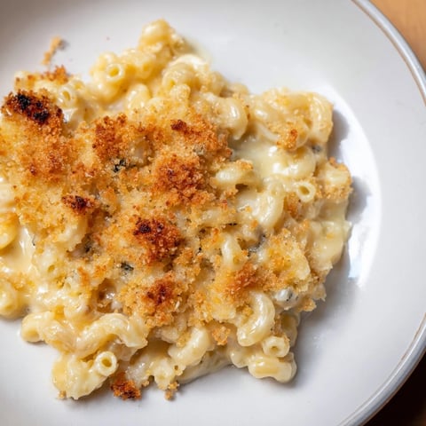 Golden, bubbly Old-Fashioned Baked Mac & Cheese with a crunchy topping ready to serve.