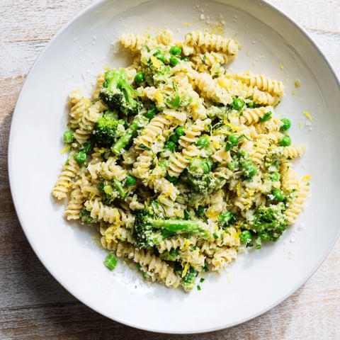 Steaming green goddess broccoli cheddar one-pot pasta, a comforting, creamy family meal bursting with flavor.