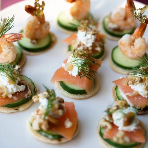 Festive champagne pairings featuring smoked salmon, cheese, fruits, and crackers perfect for parties.