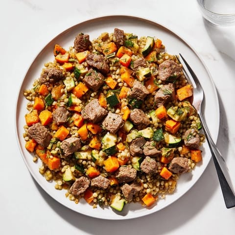 A close-up of a flavorful Sweet Lamb Platter for Baby, featuring soft lamb and vegetables.