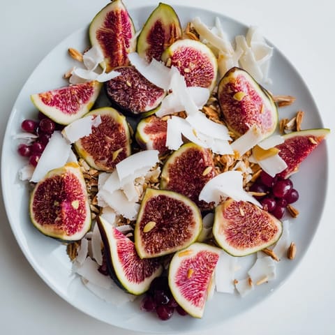 Close-up shot shows a vibrant Winter Fruit platter ready to be drizzled with honey.