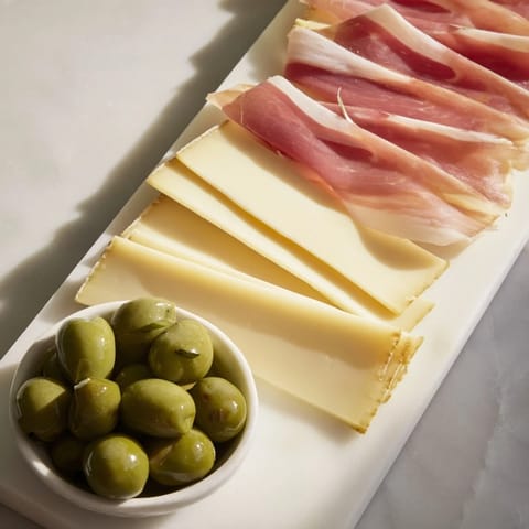 A close-up of The Minimalism Master board, showcasing gourmet ingredients arranged artfully.