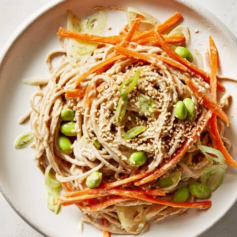 Close-up of Asian Sesame Noodle Salad, a flavorful cold dish with sesame seeds, ready to eat.