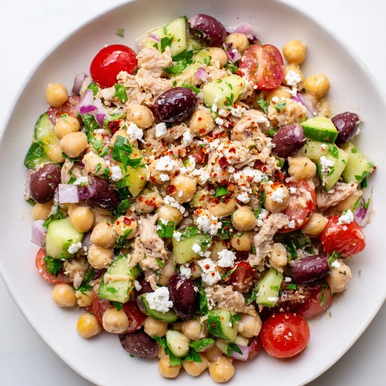 A hearty bowl of Tuna Chickpea Salad ready to eat, a perfect protein-packed lunch option.