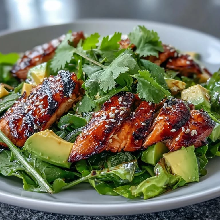 Mango Green Tea Grilled Chicken Salad with Sesame Seeds: Refreshing Asian-inspired salad with tender grilled chicken, sweet mango, and mixed greens, finished with a sesame seed garnish and zesty dressing.